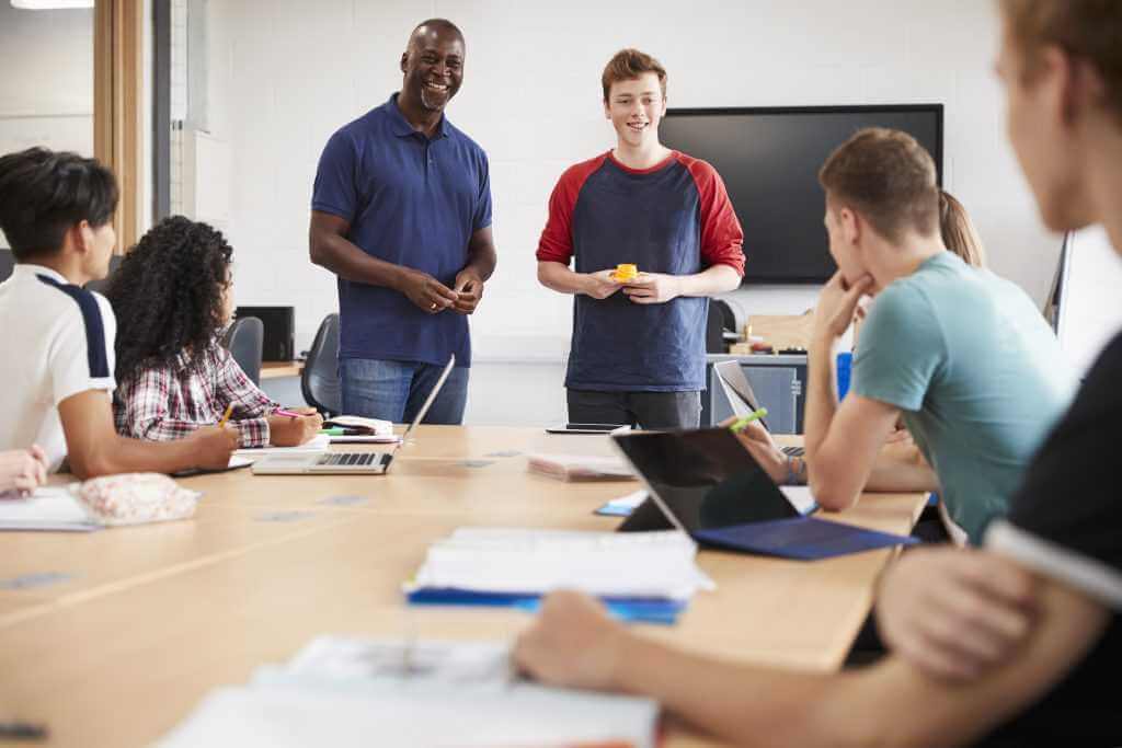 college student making presentation color